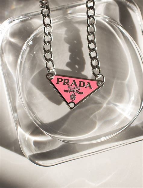 pink prada charm dupe|prada triangle dupe.